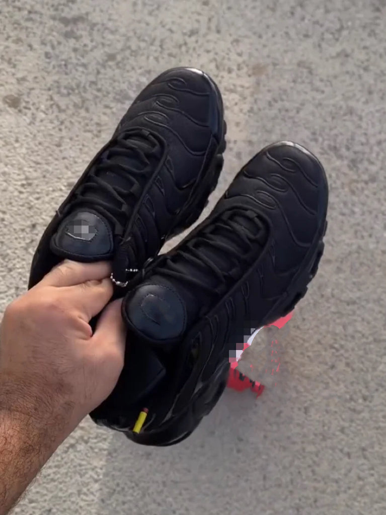 Matte black sneakers