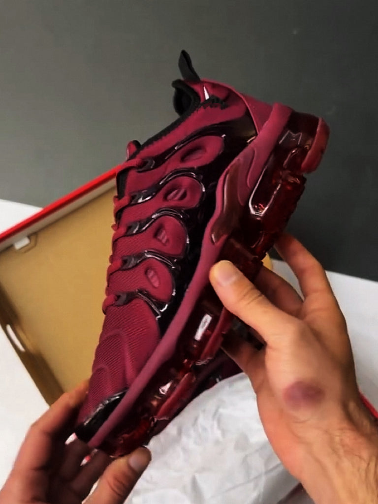 Burgundy running shoes