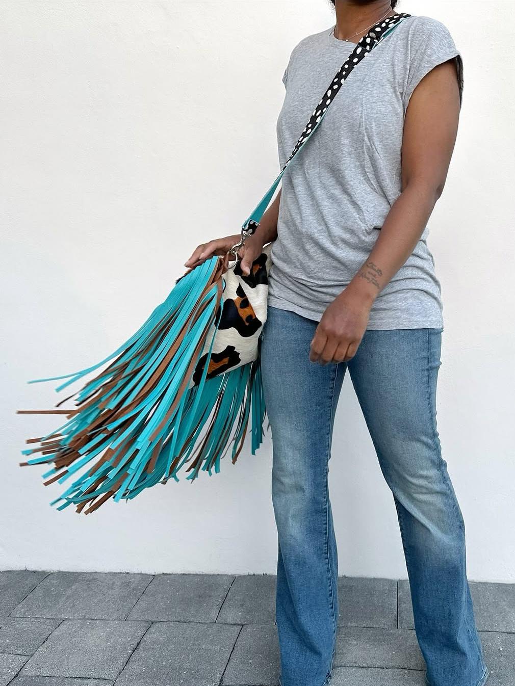 Leopard print tassel clutch crossbody bag