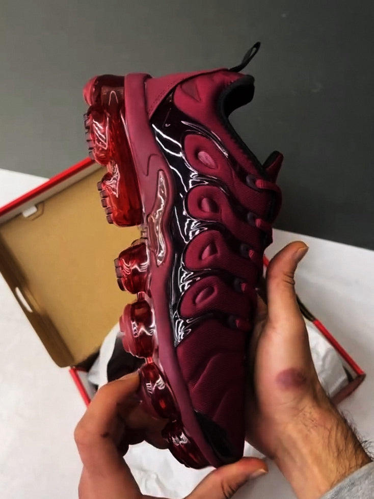 Burgundy running shoes