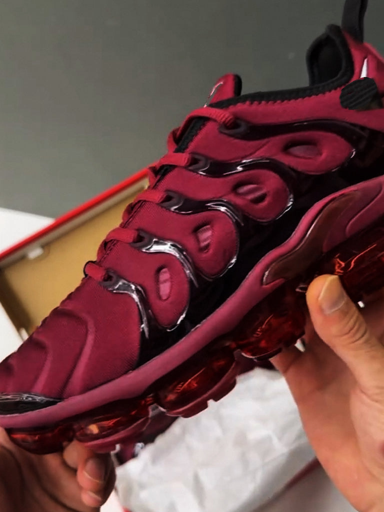 Burgundy running shoes