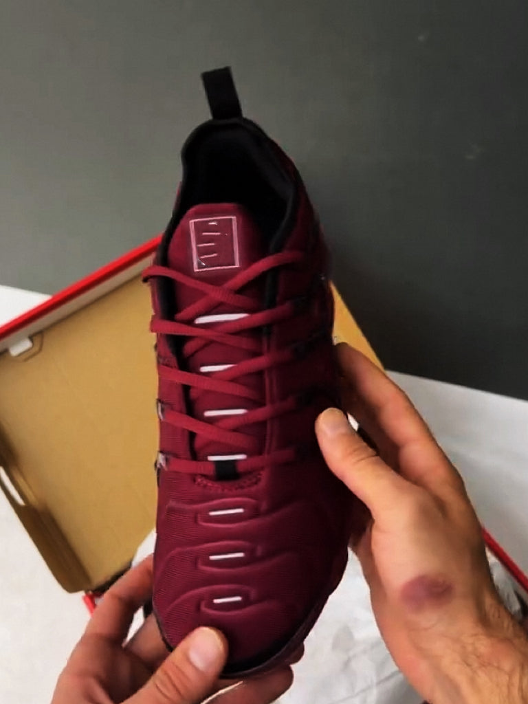 Burgundy running shoes