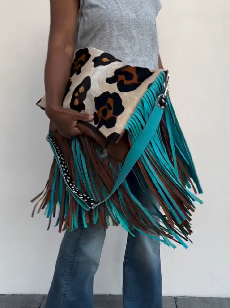 Leopard print tassel clutch crossbody bag