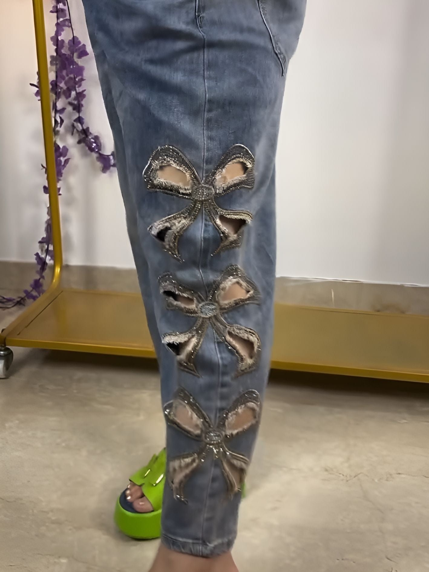 raw-edge pussy-bow jeans