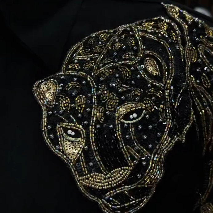 Leopard shirt on the left shoulder